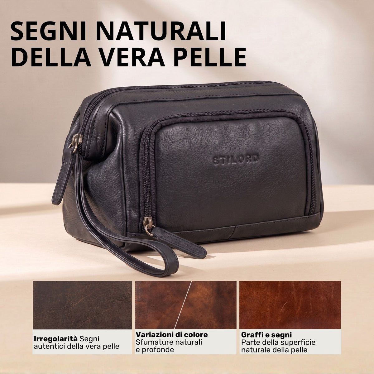 Necessaire in pelle nera con impressione STILORD, vista frontale laterale con zip e manico da polso