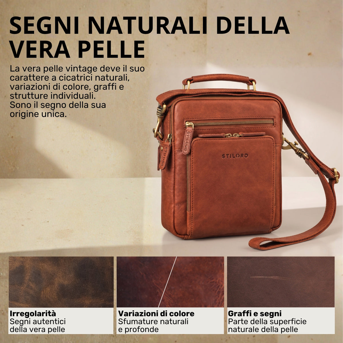 Piccola borsa a tracolla da uomo in pelle maraska marrone, vista frontale con manico, tracolla e stampa STILORD