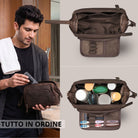 Necessaire Henry in pelle zamora marrone, interno aperto con scomparti e tasca a rete, manico a mano, uomo in bagno