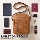 Kleine Lederschultertasche perugia-braun, Frontansicht mit Reißverschluss und verstellbarem Trageriemen, neben 8-Zoll-Tablet