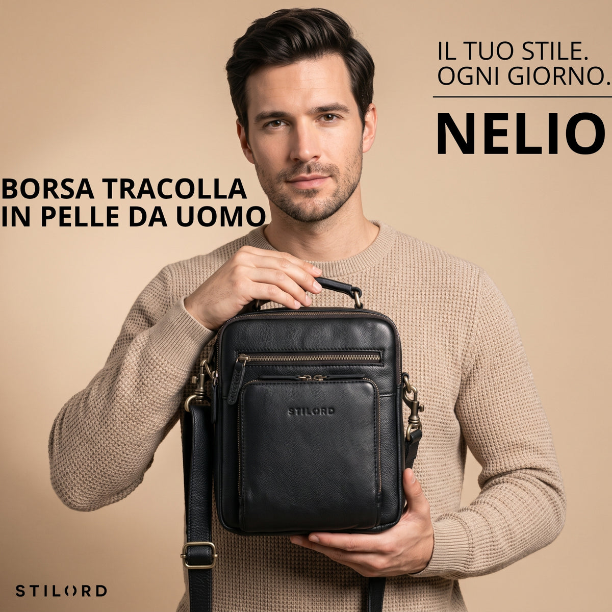 Piccola borsa tracolla uomo in pelle nera, vista frontale tenuta per il manico, tasca frontale e logo STILORD visibile